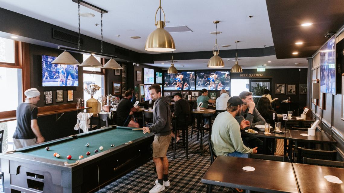 The sports bar, pool table and big screens