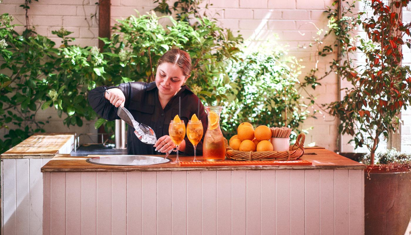 Spritzes being poured at the garden bar