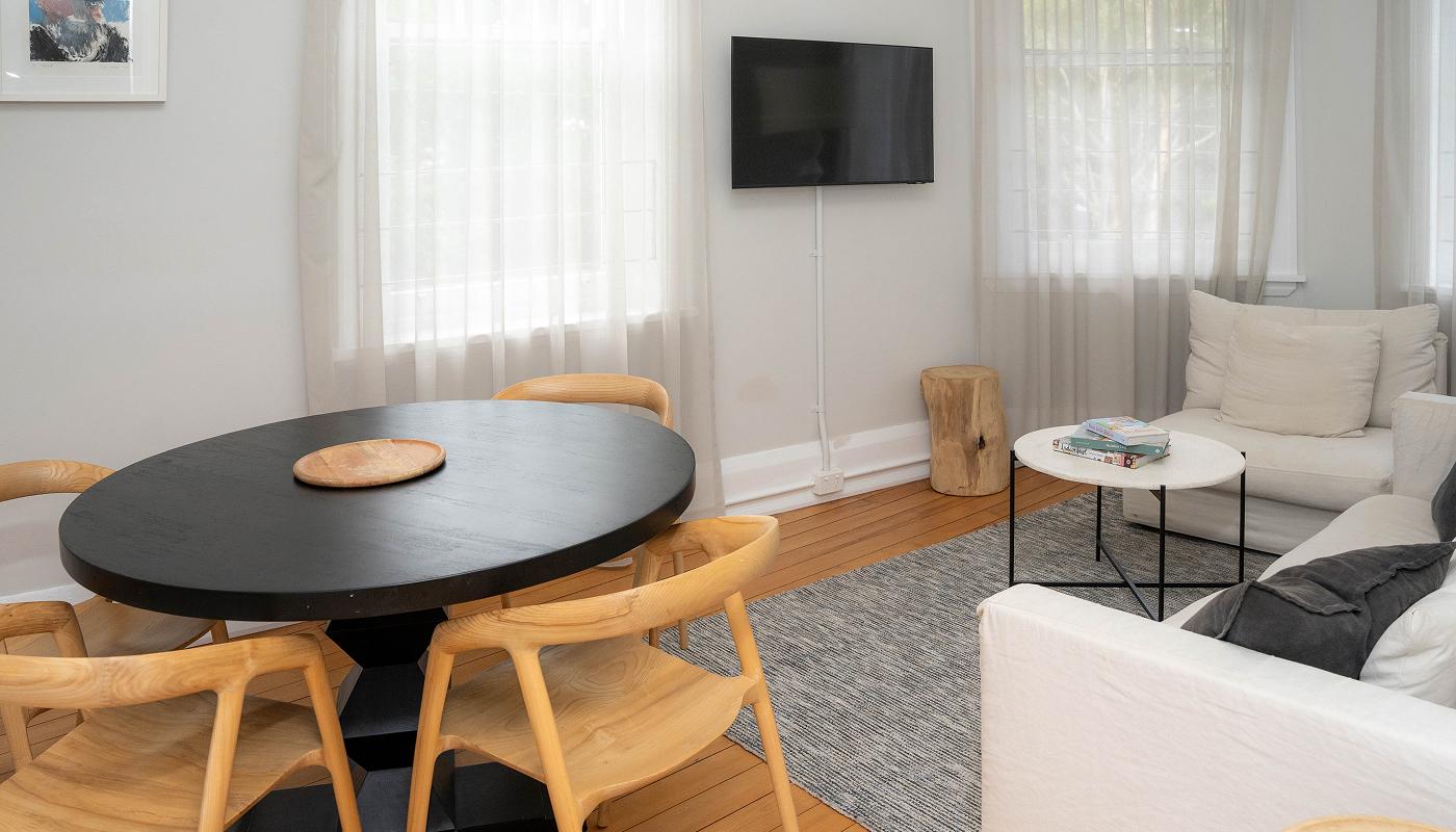 Living room with oval dining table and lounge